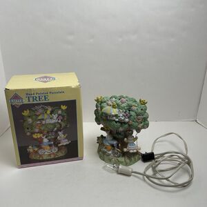 Easter lighted Tree House village/lamp Bunny on bike & swing/eggs/birds 7" EUC